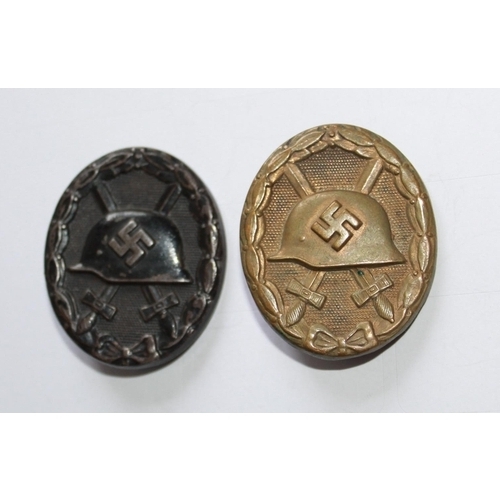 236 - Two WWII Wound Badges, in very good condition with both pins intact.