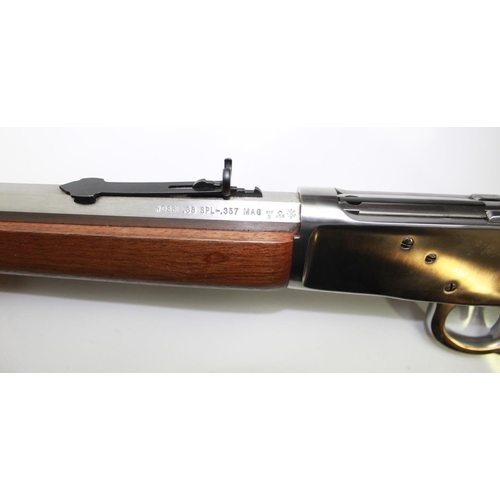 428 - Rossi 38/357 Under lever Action rifle. Stainless steel finish, wooden stock and fore-end. Overall le... 