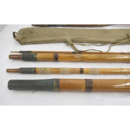 268 - A pair of vintage fishing rods. To include a split cane three-section fly rod sold by the A.W. Gamag... 