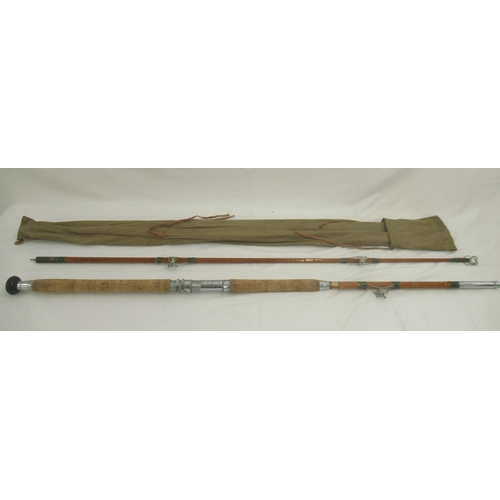 269 - A vintage unmarked split cane pier/boat rod with cork handle, awarded News of the World 'rod of the ... 