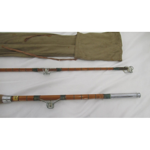 269 - A vintage unmarked split cane pier/boat rod with cork handle, awarded News of the World 'rod of the ... 