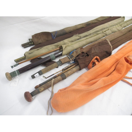 275 - Large collection of vintage fishing rods of different styles and eras and of varying condition, incl... 