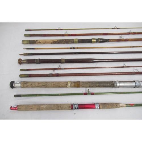 265 - Selection of four vintage fishing rods, all with signs of age-related wear. To include two unmarked ... 