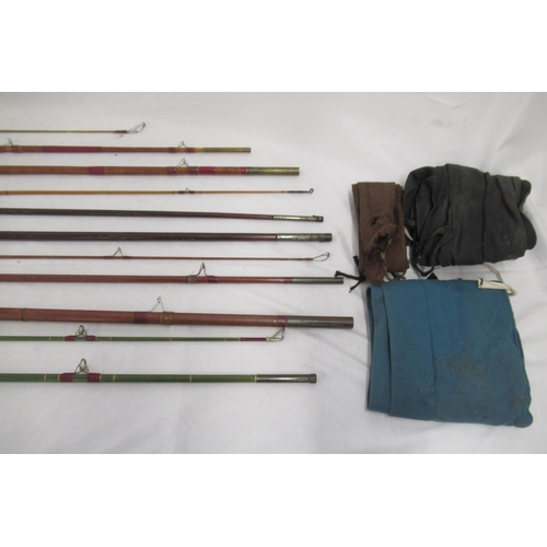 265 - Selection of four vintage fishing rods, all with signs of age-related wear. To include two unmarked ... 