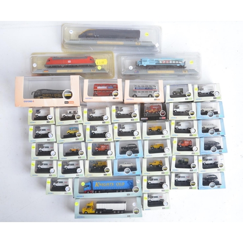 69 - Forty boxed 1/148 scale (N gauge) diecast model vehicles from Oxford diecast, mostly modern types in... 