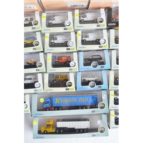 69 - Forty boxed 1/148 scale (N gauge) diecast model vehicles from Oxford diecast, mostly modern types in... 