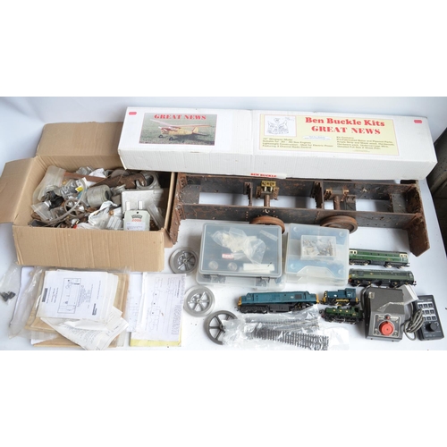 82 - Partially built G gauge steam locomotive with a box of parts, radio control transmitters, books, mag... 