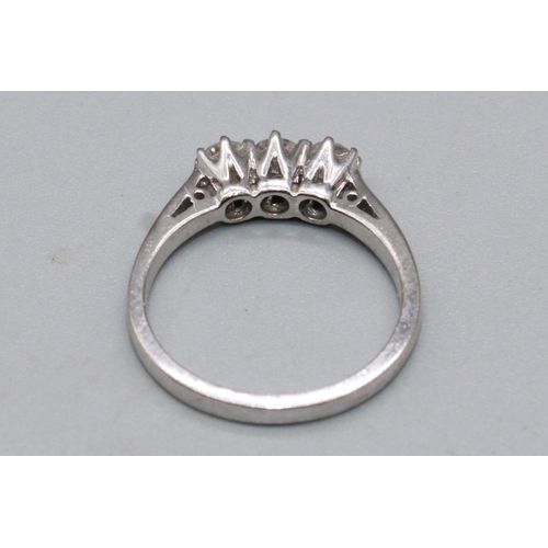 16 - 18ct white gold three stone diamond ring, stamped 750, size L, 3.4g (A/F - chipped stone)