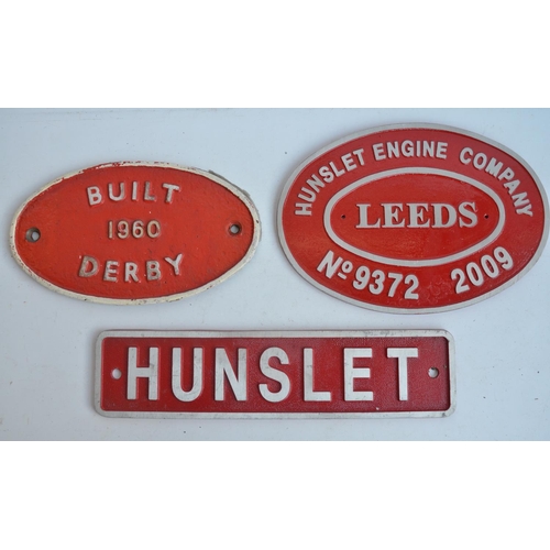 100 - Two relief cast metal loco plates to include No9372 (2009) and Hunslet (37x8.8cm) and a wagon plate ... 