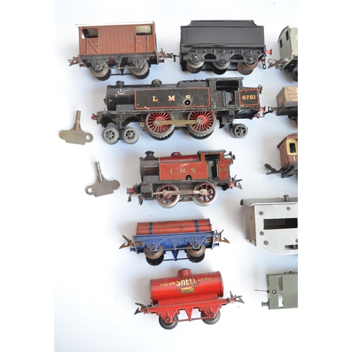 93 - Collection of vintage tin plate O gauge railway models from Hornby Meccano to include clockwork LMS ... 