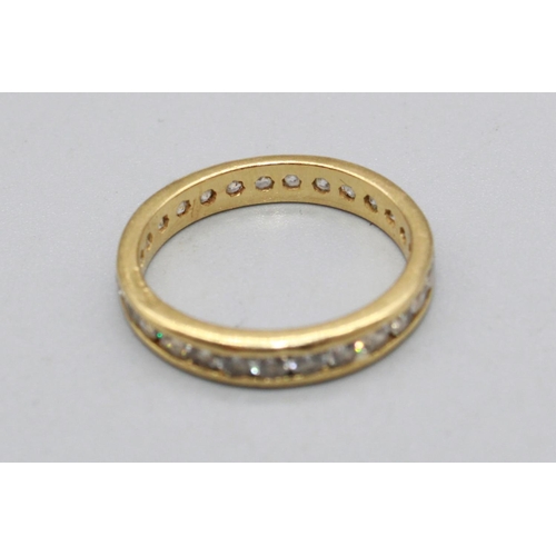 13 - 18ct yellow gold eternity, set with white stones, stamped 750, M1/2, 2.9g