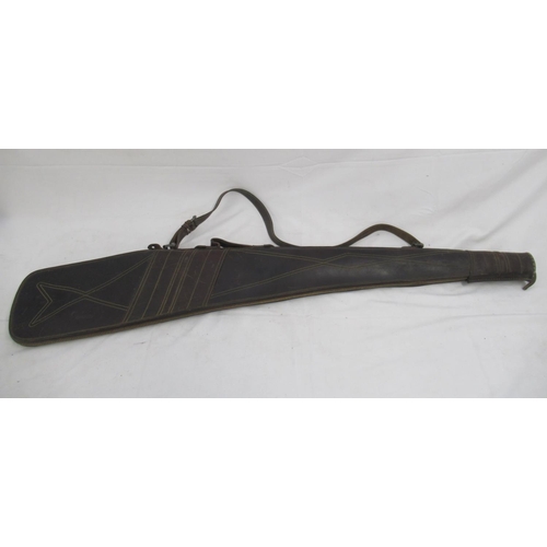 283 - Hawk Eye wool-lined leather gun slip with decorative stitching, with zip in good working order. With... 