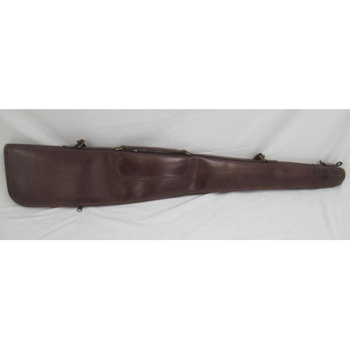 284 - Powell and Son wool-lined leather gun slip. With light age-related scuffing to extremities and minor... 