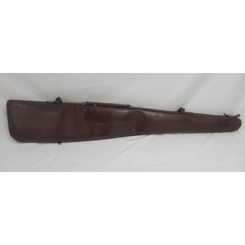 284 - Powell and Son wool-lined leather gun slip. With light age-related scuffing to extremities and minor... 