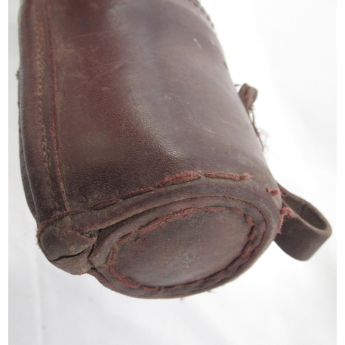 284 - Powell and Son wool-lined leather gun slip. With light age-related scuffing to extremities and minor... 