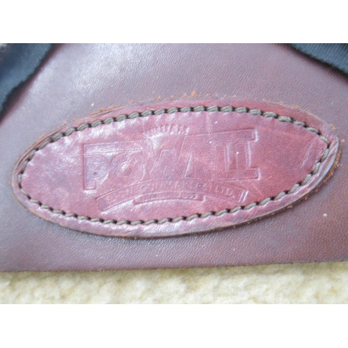 284 - Powell and Son wool-lined leather gun slip. With light age-related scuffing to extremities and minor... 