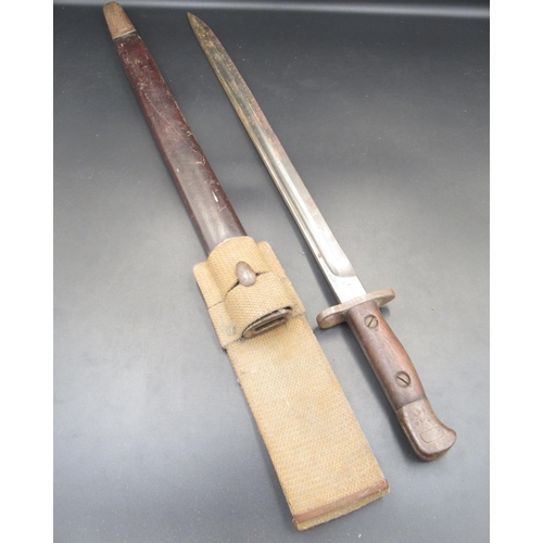 257 - British 1907 pattern bayonet, manufactured by James A. Chapman. Complete with original scabbard and ... 