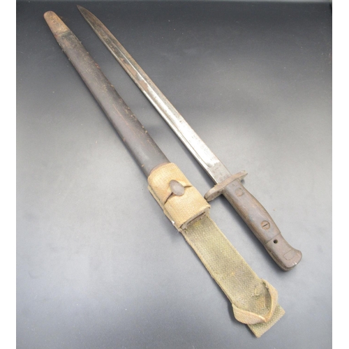 258 - British 1907 pattern bayonet, manufacturer unknown. Complete with original scabbard and canvas belt ... 