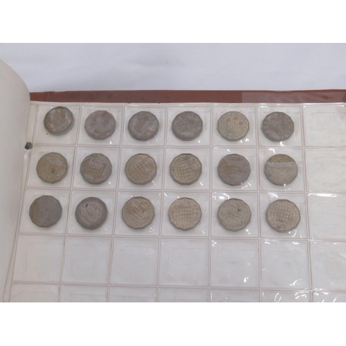 144 - Assorted collection of GB and International coins, loose, in blue fold-out books, and album