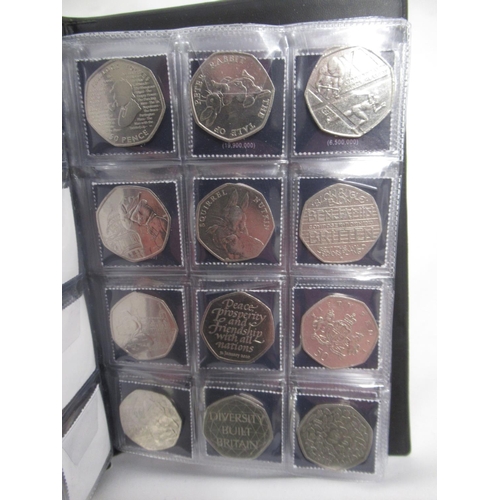 171 - 4 UK Coin Hunt folders cont. 50ps 10ps & £2s, The Beatrix Potter 50p Coin Collector Album (filled) &... 