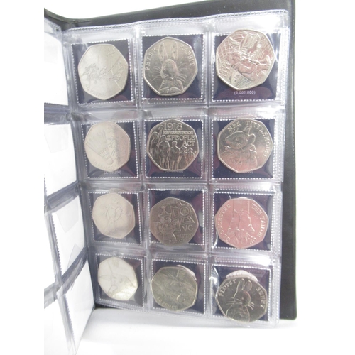 171 - 4 UK Coin Hunt folders cont. 50ps 10ps & £2s, The Beatrix Potter 50p Coin Collector Album (filled) &... 