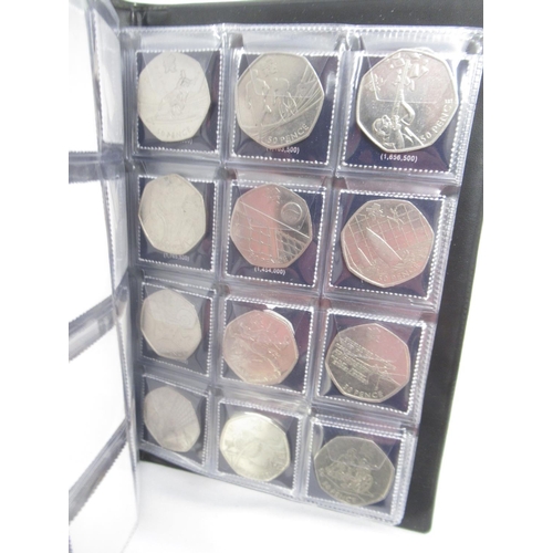 171 - 4 UK Coin Hunt folders cont. 50ps 10ps & £2s, The Beatrix Potter 50p Coin Collector Album (filled) &... 