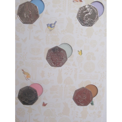 171 - 4 UK Coin Hunt folders cont. 50ps 10ps & £2s, The Beatrix Potter 50p Coin Collector Album (filled) &... 