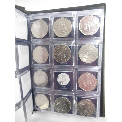 171 - 4 UK Coin Hunt folders cont. 50ps 10ps & £2s, The Beatrix Potter 50p Coin Collector Album (filled) &... 