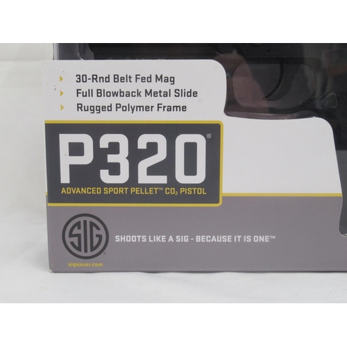 304 - Sig Sauer P320 .177 CO2 air pistol with 30 rnd belt fed magazine, in original box