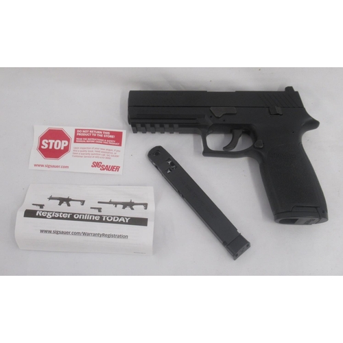 304 - Sig Sauer P320 .177 CO2 air pistol with 30 rnd belt fed magazine, in original box