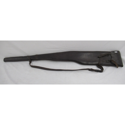 285 - Unbranded leather gun slip with cleaning rod compartment, complete with cleaning rod. Scuffs and abr... 