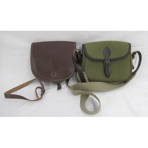 289 - Pair of unbranded cartridge bags. To include a leather bag with dual compartments, in good condition... 