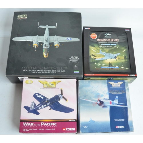 122 - Four 1/72 scale diecast WWII US aircraft models to include Forces Of Valor B-25J Mitchell (fair/good... 