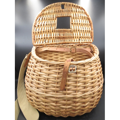 292 - Vintage wicker fly-fishing basket in excellent condition, with leather fasteners and a canvas carryi... 