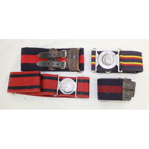 252 - Four Stable belts of various Regiments including REME etc.