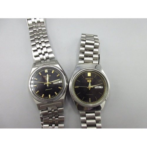 505 - Two Seiko 5 6309 Middle Eastern and European market stainless steel automatic wristwatches with day ... 