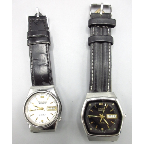 513 - Two Citizen JDM stainless steel automatic wristwatches with English/Kanji day date, nos. 950594 and ... 