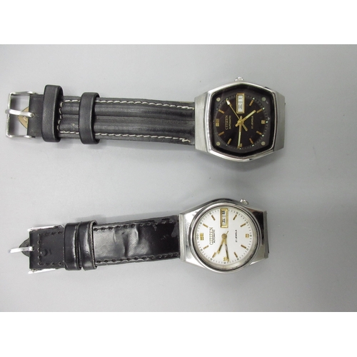 513 - Two Citizen JDM stainless steel automatic wristwatches with English/Kanji day date, nos. 950594 and ... 