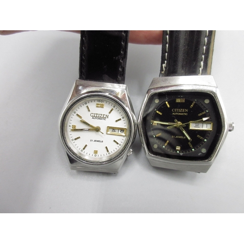 513 - Two Citizen JDM stainless steel automatic wristwatches with English/Kanji day date, nos. 950594 and ... 