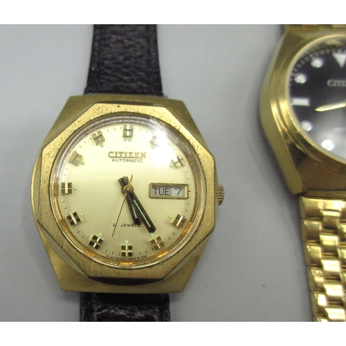 517 - Two Citizen Middle Eastern market gold plated automatic wristwatches with day date, nos. 01101270 an... 