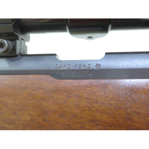 446 - Sako P945 .22 calibre bolt action rifle. With detachable moderator, Nikko scope, and original magazi... 