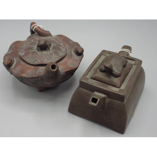 1003 - Chinese Yixing clay teapot with a tortoise cover in a tapered rectangular form, and a lotus flower f... 