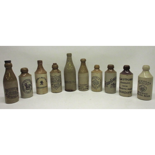 210 - A collection of ten stoneware ginger beer and stout bottles from across the United Kingdom, includin... 