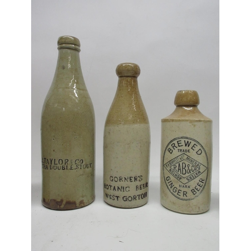 210 - A collection of ten stoneware ginger beer and stout bottles from across the United Kingdom, includin... 