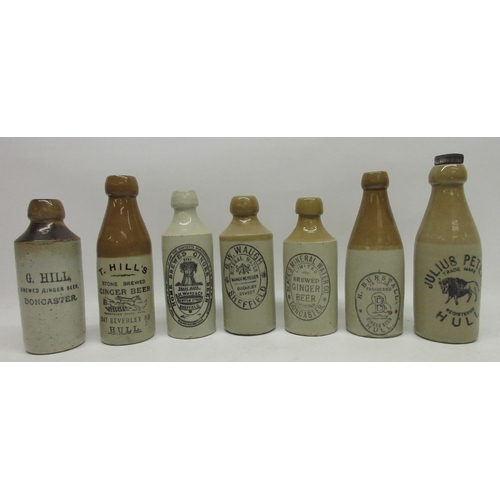 212 - A collection of seven stoneware ginger beer and stout bottles from across Yorkshire, including Hull,... 