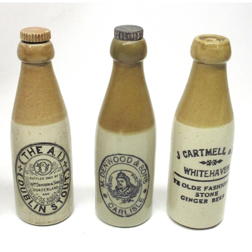 213 - A collection of nine stoneware ginger beer and stout bottles from across northern England, including... 