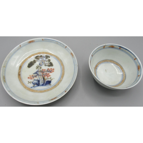 1001 - Nanking cargo porcelain tea bowl and saucer, with tree and floral decoration, cup D7.5cm