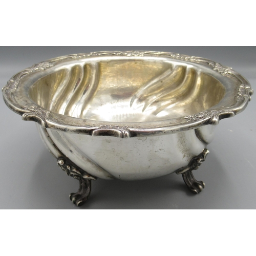 1038 - Vanessa Feltz - German silver bowl with a decorative scroll and floral rim and stood on four scroll ... 