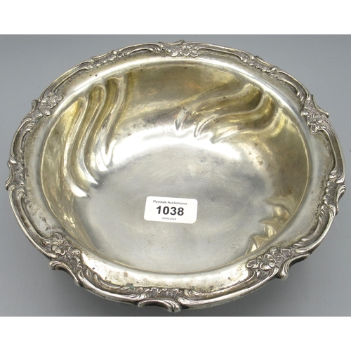 1038 - Vanessa Feltz - German silver bowl with a decorative scroll and floral rim and stood on four scroll ... 