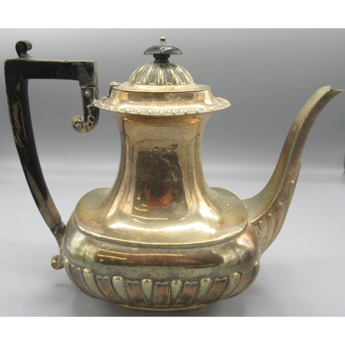 40 - Victorian silver teapot, part lobed decoration with ebonised handle and finial by James Deakin & Son... 